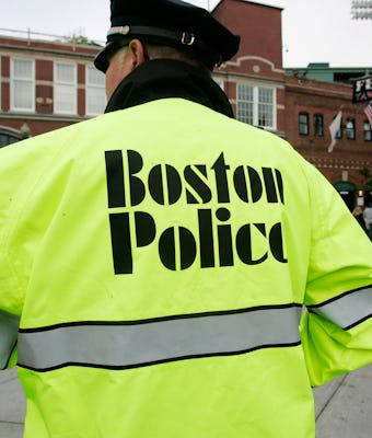 (052909 Boston, MA) A Boston Police Officer works at the corner of Yawkey Way near Fenway Park bef...