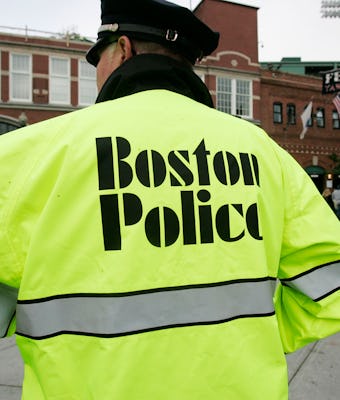 (052909  Boston, MA)  A Boston Police Officer works at the corner of Yawkey Way near Fenway Park bef...
