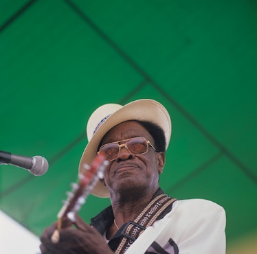 NEW ORLEANS - APRIL 09 : Lightnin' Hopkins performs on stage at the New Orleans Jazz and Heritage Fe...