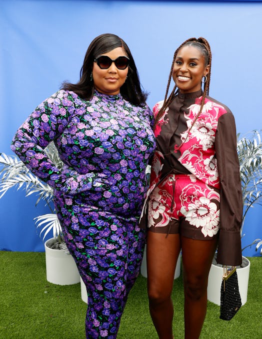 Lizzo wearing a floral catsuit.