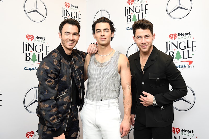 NEW YORK, NEW YORK - DECEMBER 10: (L-R) Kevin Jonas, Joe Jonas, and Nick Jonas of The Jonas Brothers...