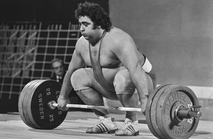Soviet weightlifter Vasily Alekseyev (1942 - 2011) sets a new world record in the Clean and Jerk Sup...