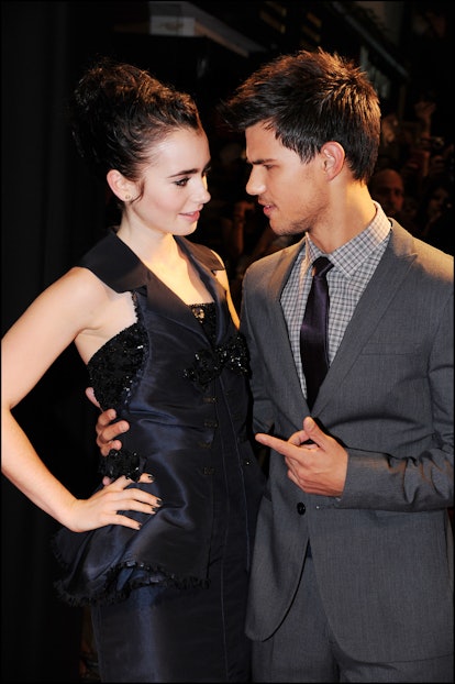 Taylor Lautner and Lily Collins attend the premiere of  "Abduction" (Identité secrete) at Cinema Gau...