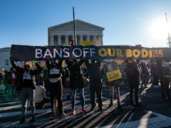 WASHINGTON, DC - DECEMBER 01:  Abortion rights advocates and anti-abortion protesters demonstrate in...