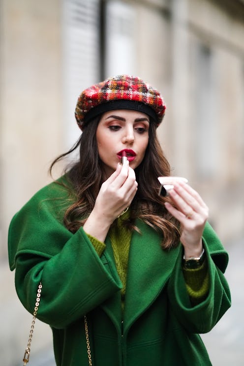 PARIS, FRANCE - NOVEMBER 11: Sara Carnicella wears a green long coat with large oversized lapels fro...