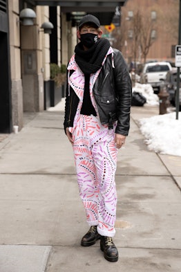  A person poses showing off their abstract printed pants.
