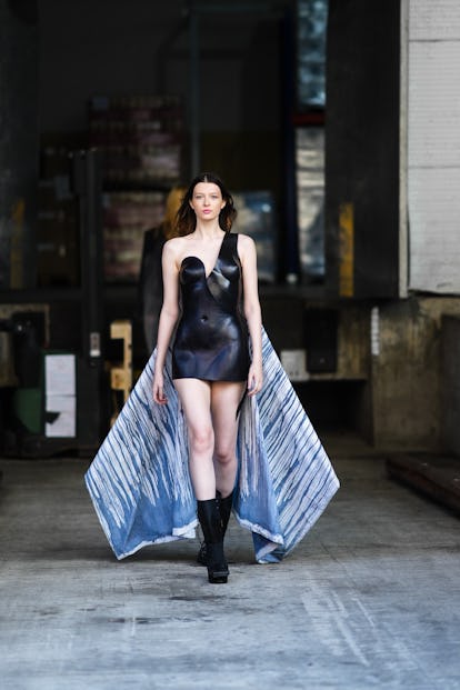 A model walked the runway in a little black dress with a dramatic train on July 24, 2021 in Sibiu, ...