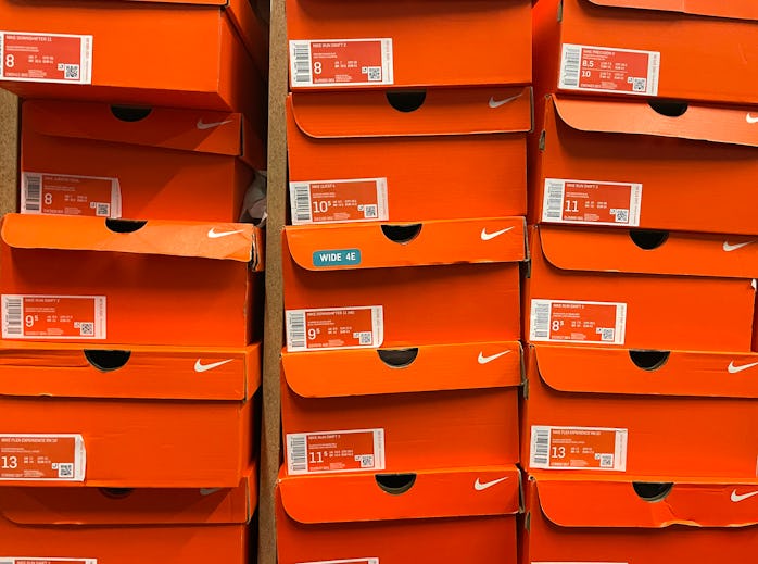 NOVATO, CALIFORNIA - SEPTEMBER 27: Stacks of Nike shoe  boxes sit on a shelf at a shoe store on Sept...