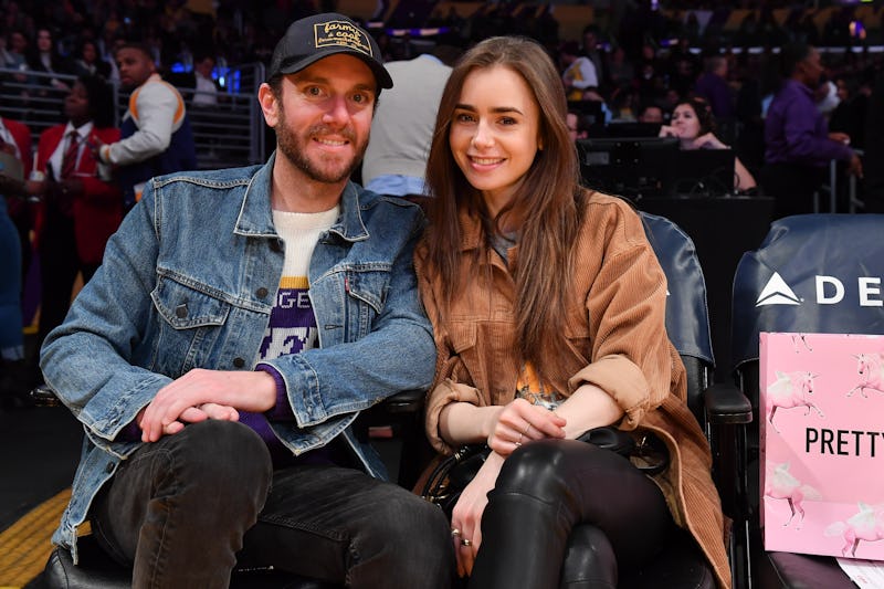 LOS ANGELES, CALIFORNIA - JANUARY 13: Lily Collins and Charlie McDowell attend a basketball game bet...