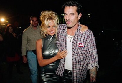 Pamela Anderson and Tommy Lee Hugging (Photo by �� Steve Starr/CORBIS/Corbis via Getty Images)