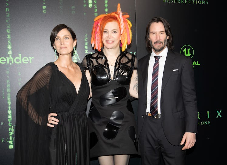 SAN FRANCISCO, CALIFORNIA - DECEMBER 18: (L-R) Carrie-Anne Moss, Lana Wachowski, and Keanu Reeves at...