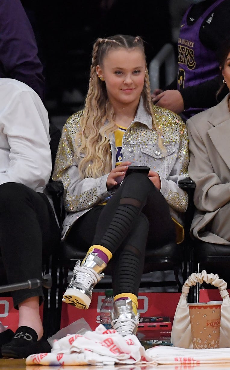 LOS ANGELES, CA - DECEMBER 12: JoJo Siwa attends the game between the Los Angeles Lakers and Orlando...