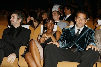Alfonso Cuaron, director, Claire-Hope Ashitey and Clive Owen (Photo by J. Vespa/WireImage)