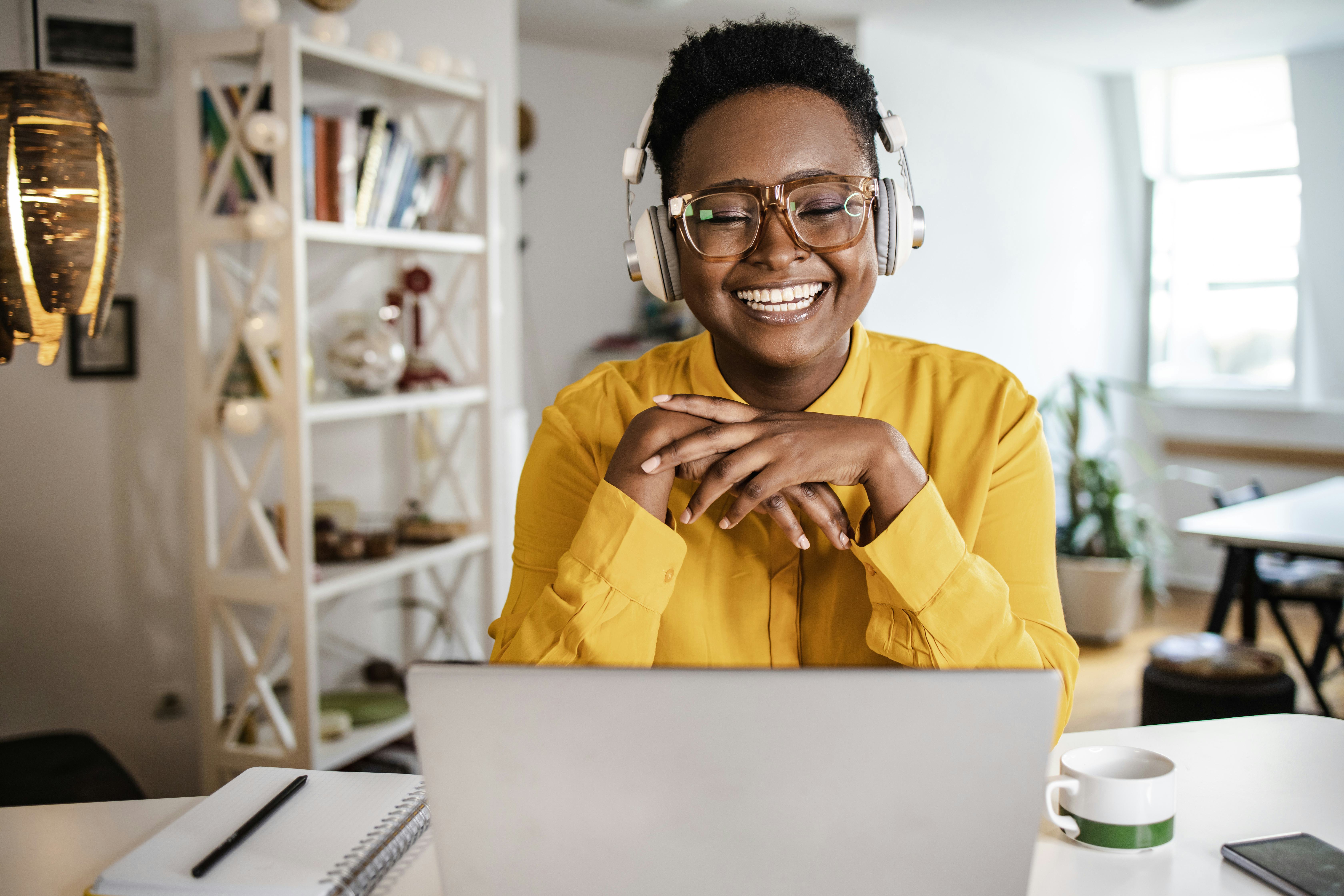 Portrait of diligent young businesswoman sitting at her desk. Capricorn season 2021-2022 starts on D...