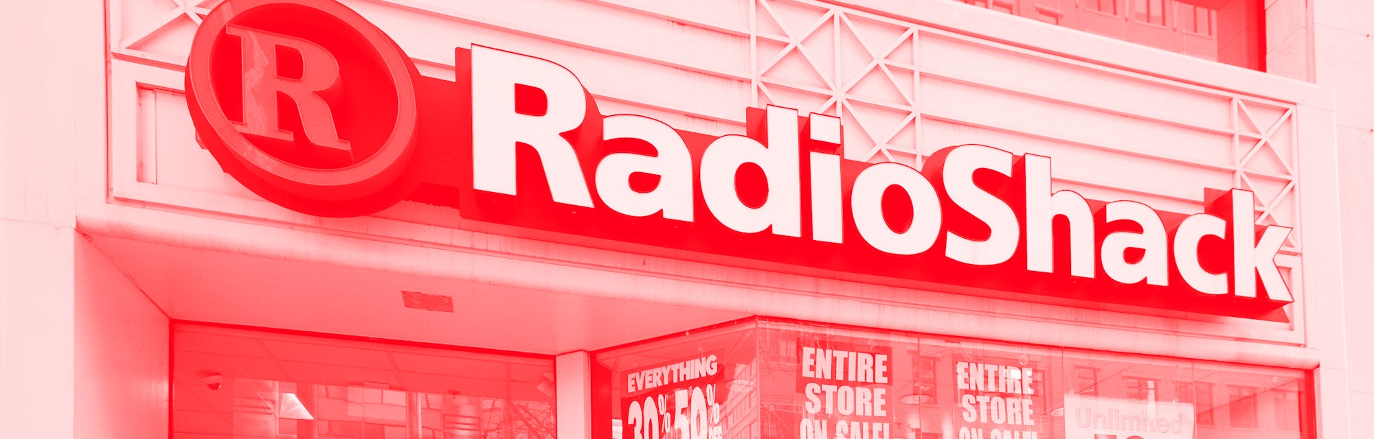 A businessman walks past the Radio Shack in downtown Washington, DC, March 16, 2017, one of the 365 ...