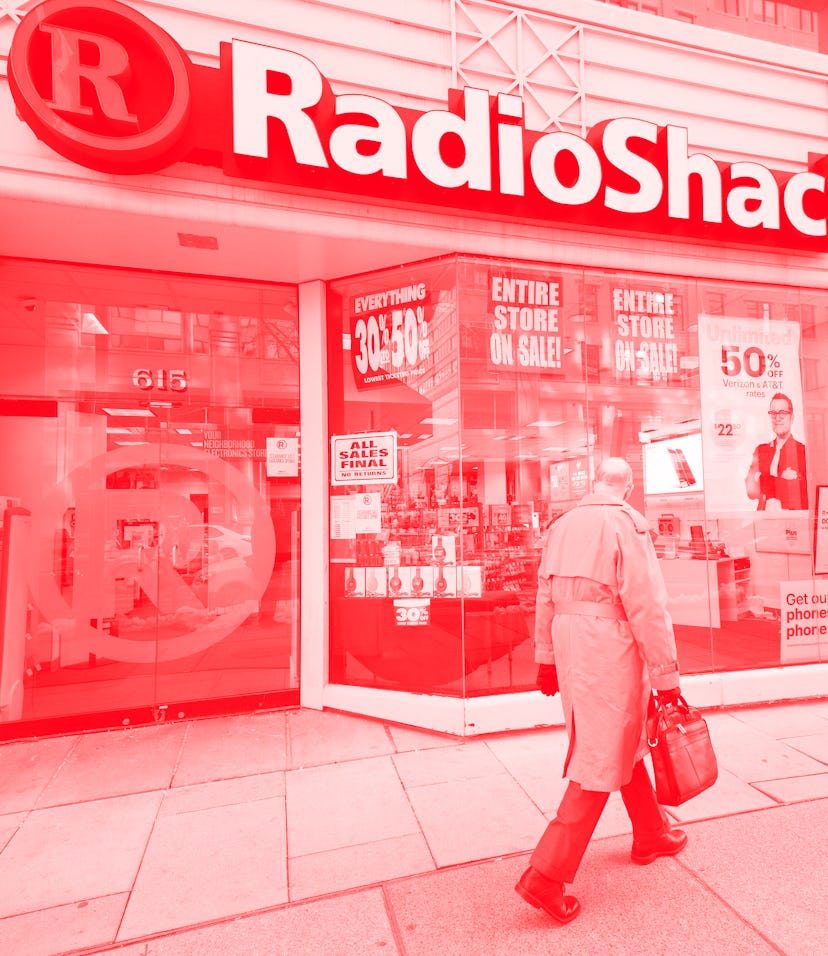 A businessman walks past the Radio Shack in downtown Washington, DC, March 16, 2017, one of the 365 ...