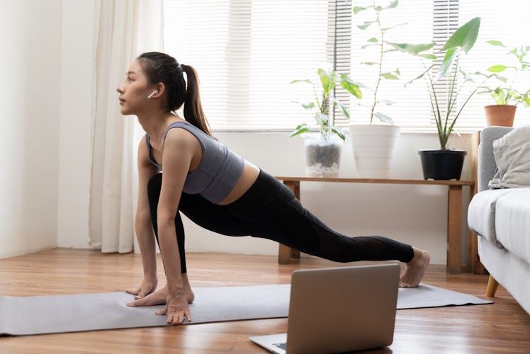 Try a crescent lunge pose during this January 2022 yoga flow sequence.