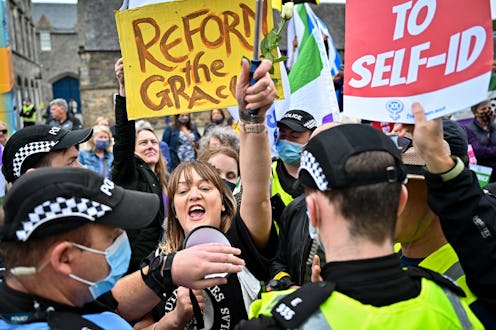 EDINBURGH, SCOTLAND - SEPTEMBER 02: Trans Rights activists hold a counter demonstration next to a wo...