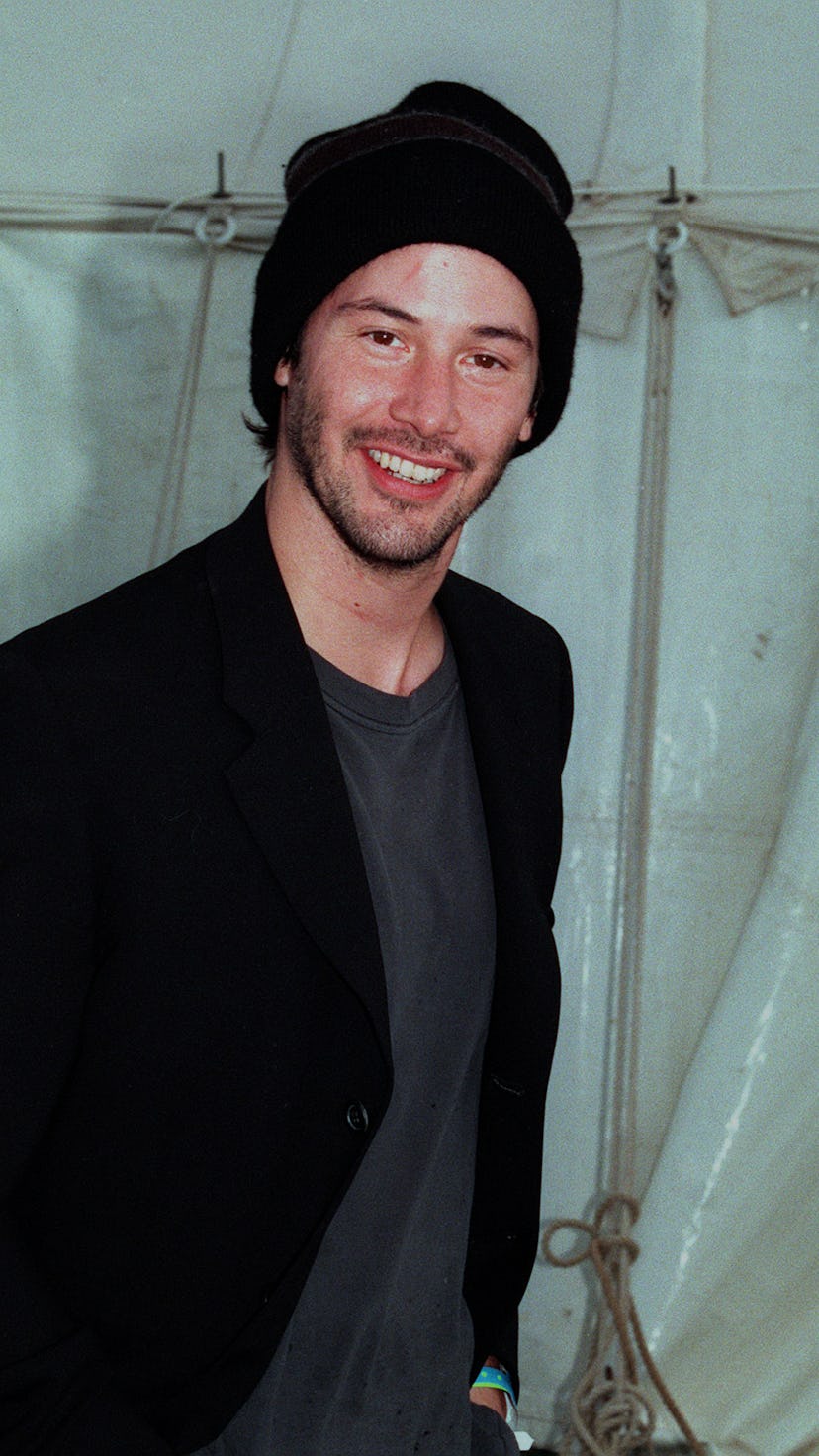 Hollywood film star Keanu Reeves at the 1999 Glastonbury Festival, where he performed on stage with ...