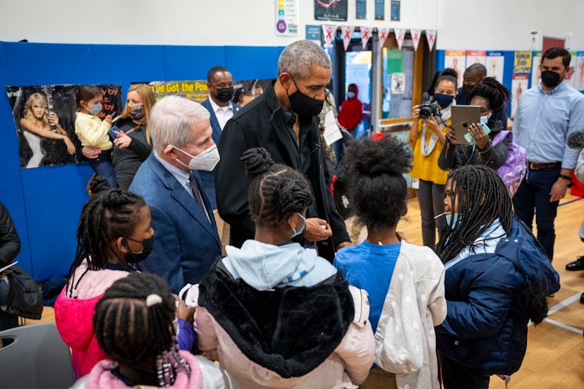 WASHINGTON, DC - NOVEMBER 30: Former U.S. President Barack Obama (C) and Dr. Anthony Fauci (L), Dire...