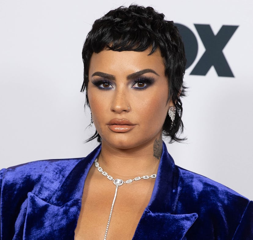 Check out Demi Lovato's Christmas Instagram video, which showed of their shaved head.