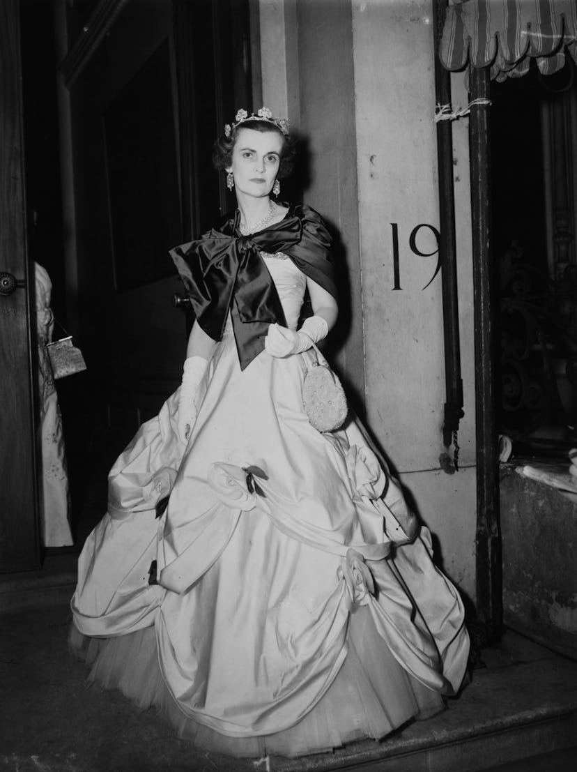 Margaret Campbell, Duchess of Argyll (1912 - 1993) wearing an elaborate ballgown and tiara, 4th June...
