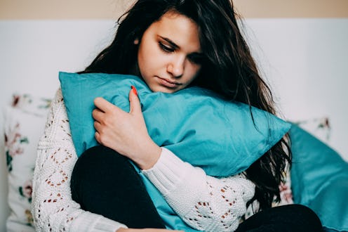 Sick woman in bed