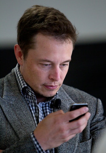 CEO Elon Musk waits for the start of the event as Tesla launched the Model S, at their factory in Fr...