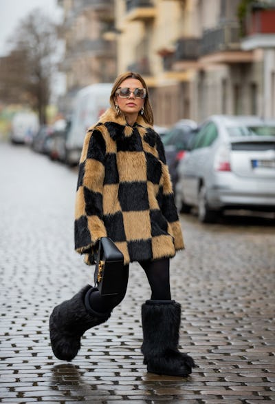 Amelie Stanescu wore checkered, winter coat from Coat Stand Studio.