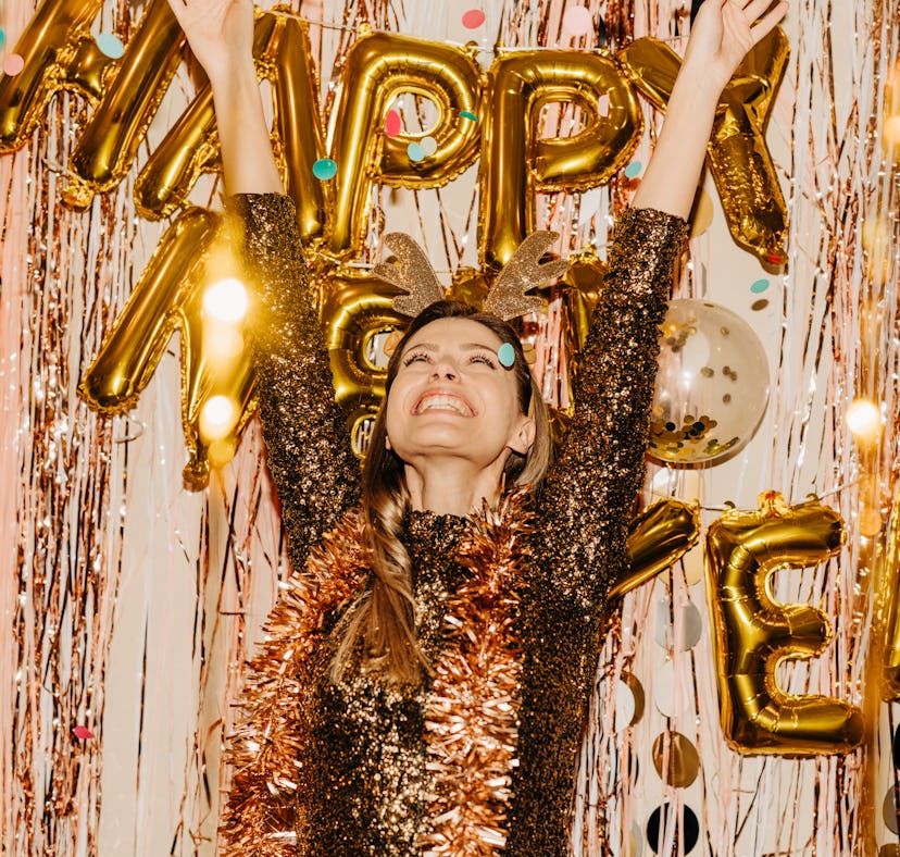 A woman uses New Year's Eve 2021 Instagram captions after her NYE party.