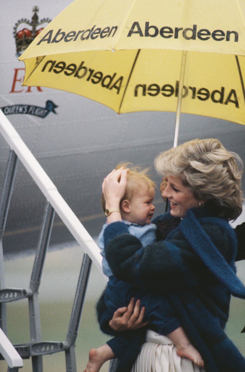 Princess Diana protects her baby boy.