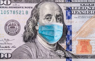 Coronavirus Wuhan. US quarantine, 100 dollar banknote with medical mask. The concept of epidemic and...