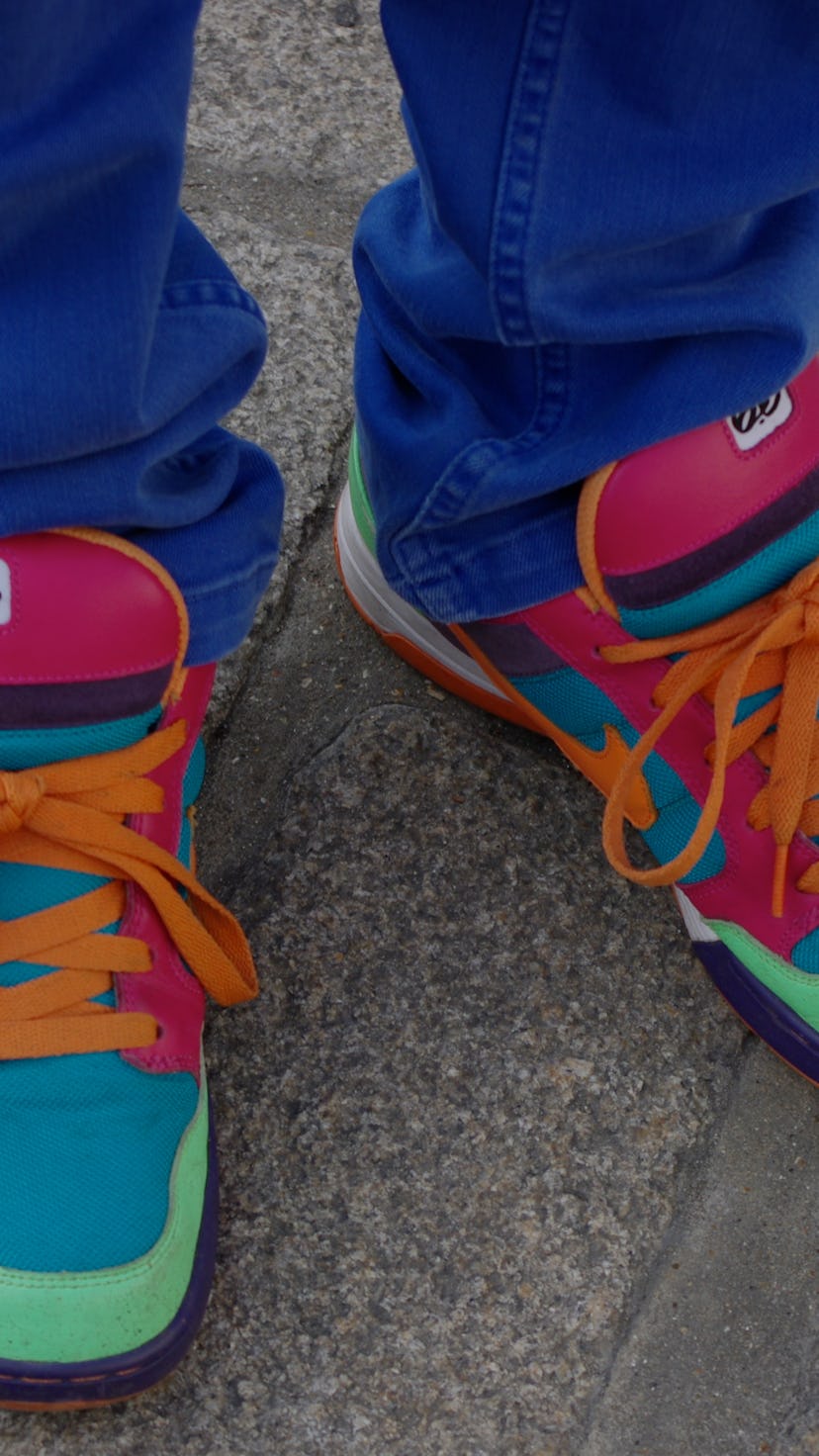 Men's Nike 6.0 High Tops Dunk sneakers worn with bright blue jeans