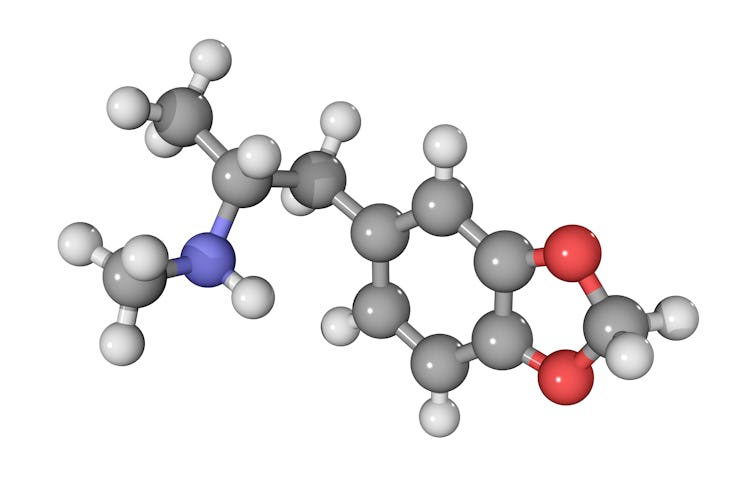 MDMA drug, molecular model. Atoms are represented as spheres and are colour-coded: carbon (grey), hy...
