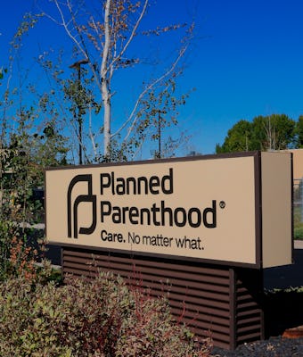 Planned Parenthood clinic entrance showing entry sign and building, This clinic is in Pullman Washin...
