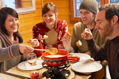 One of the things to do for your 20th birthday in the winter include a fondue party.