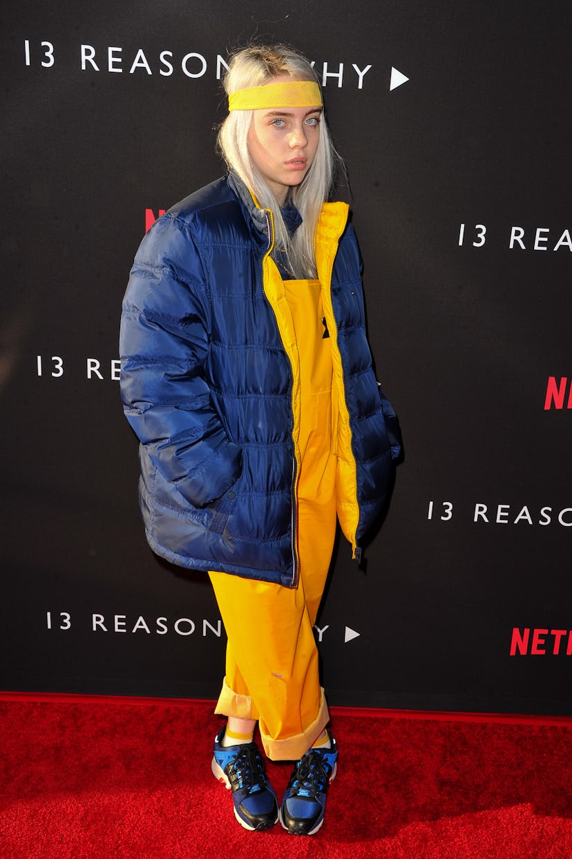 See every "ugly" '90s trend Billie Eilish wears like a pro, from Dad sneakers to bucket hats.