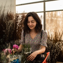 Woman shopping for flowers and plants