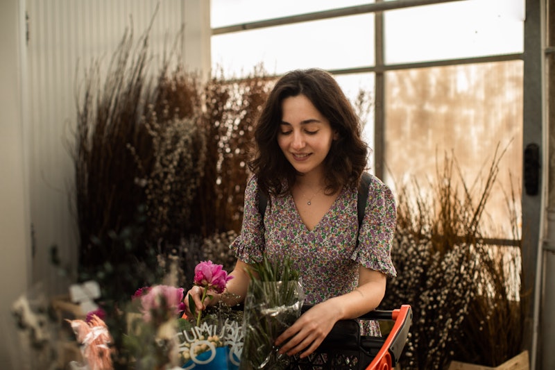 Woman shopping for flowers and plants