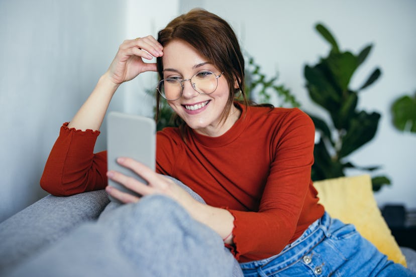 Facetiming a friend is one way to celebrate New Year's when you're alone at home.