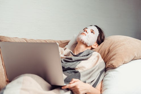 woman trying to relax on the couch