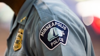 MINNEAPOLIS, MN - JUNE 16: Minneapolis Police Deputy Chief Art Knight speaks with people gathered ne...