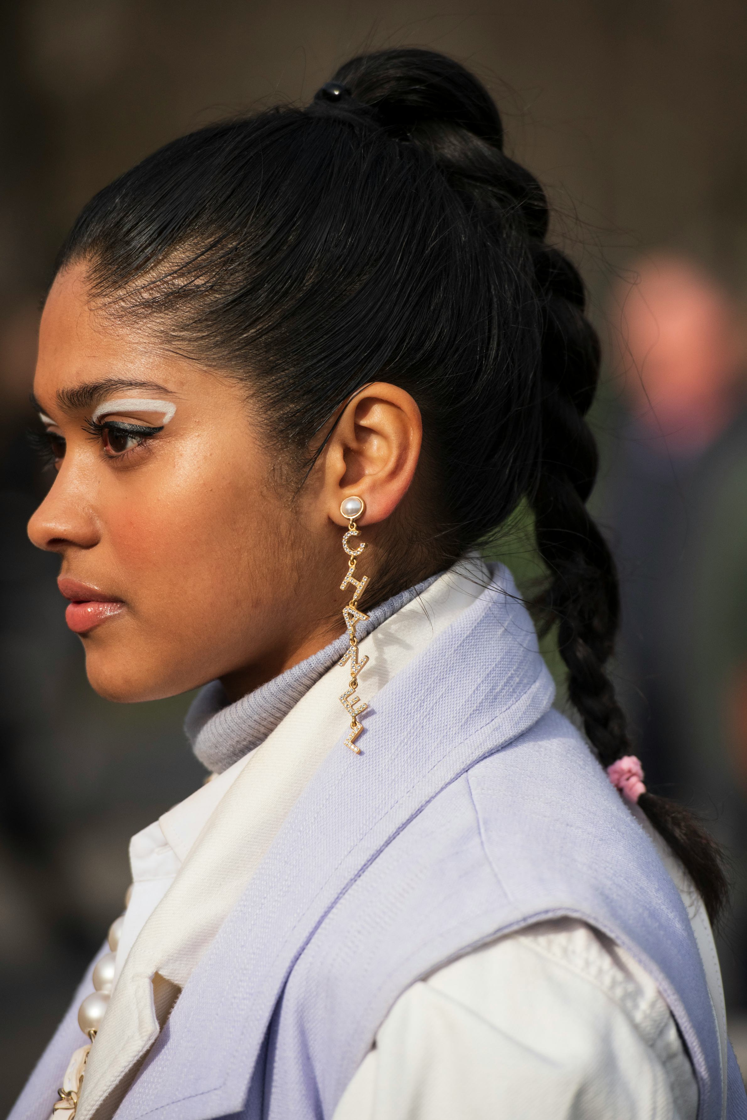 From neon stickers to classic white eyeliner, here are the best eyeliner looks to end 2021.