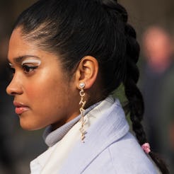 From neon stickers to classic white eyeliner, here are the best eyeliner looks to end 2021.