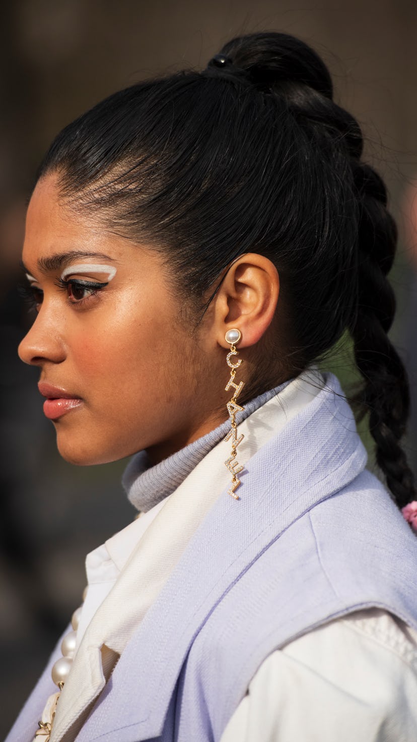 From neon stickers to classic white eyeliner, here are the best eyeliner looks to end 2021.