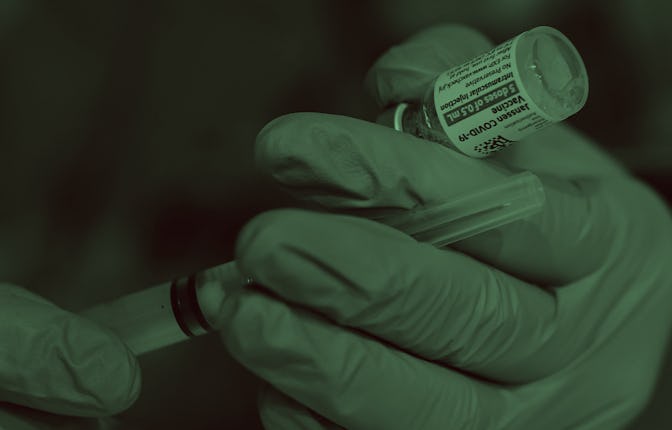 ORLANDO, FLORIDA, UNITED STATES - 2021/04/25: An Army nurse fills a syringe with the Johnson & Johns...