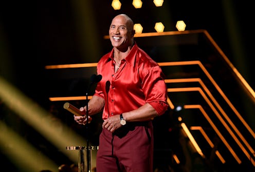 SANTA MONICA, CALIFORNIA - DECEMBER 07: Dwayne Johnson is honored with the People's Champion Award d...
