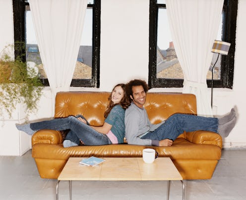 Young couple playing Mr & Mrs