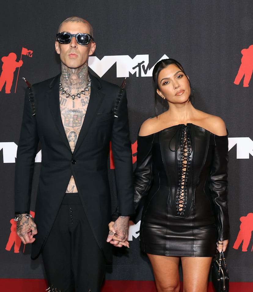 Kourtney Kardashian got tattoos, thanks to Travis Barker's Instagram filter, and it's too good.