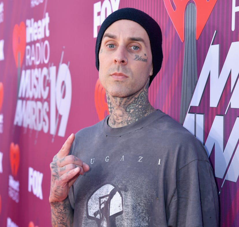 Someone hated on Travis Barker's tattoos and he had a perfect response.